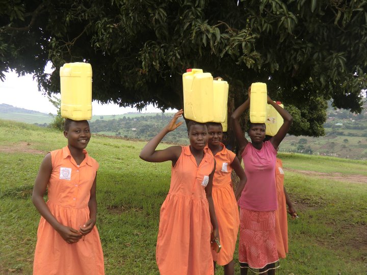 girls carrying water Uganda 2011